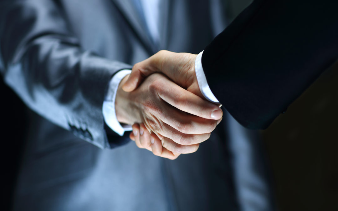 close up hands during business buyer interview